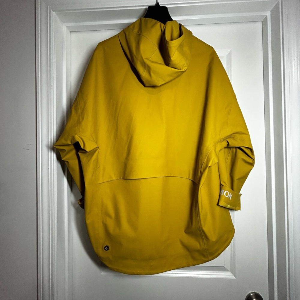 Lululemon Into The Drizzle 1/2 Zip
Yellow Hooded Jacket - Picture 3 of 3